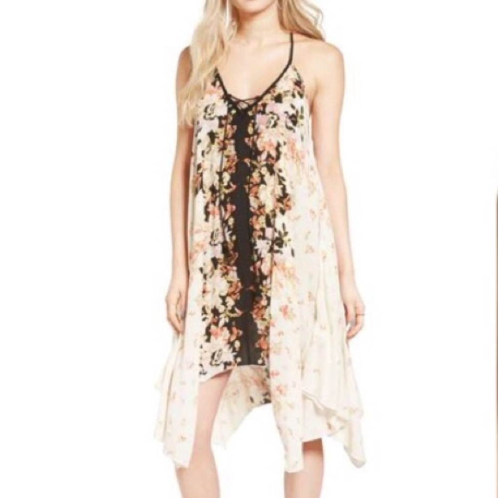 Light flirty handkerchief hem summer dress